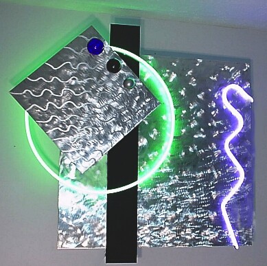 Neon art gallery of neon art by the neon sculpture artist Viscardi, Also including neon clocks and brushed aluminum sculptures
